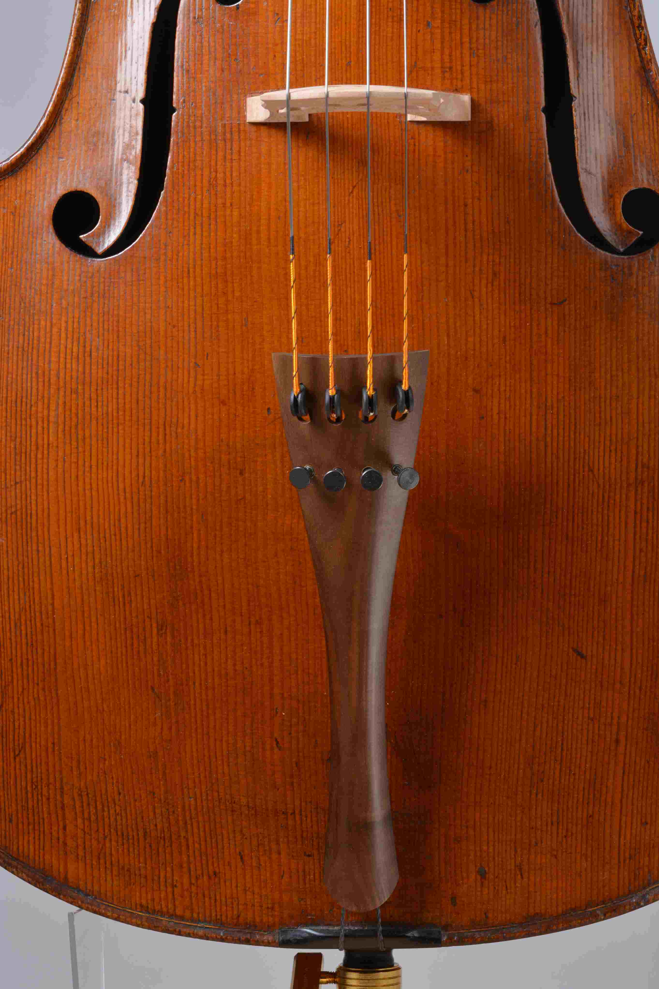 Cello tailpiece from Sonowood maple made by Wilhelm Geigenbau